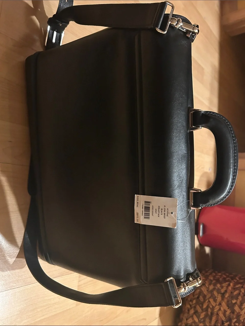 Cole Haan Sebastian Black Leather Briefcase with Top Handle and Shoulder Strap